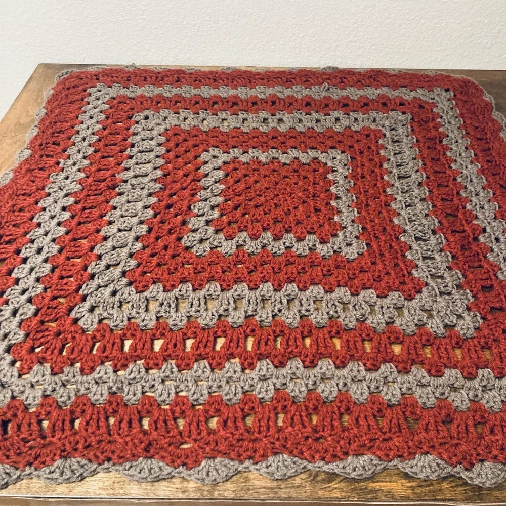 Vintage hand made retro burnt orange and grey knitted crochet granny table cover